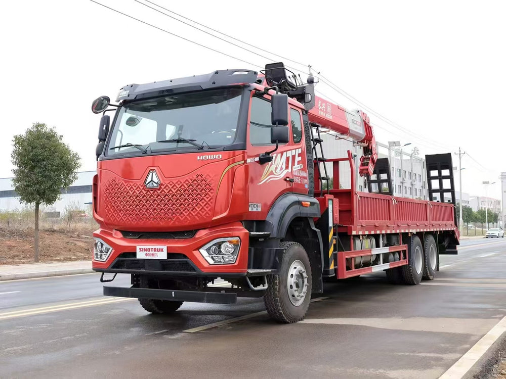HOWO 12T truck-mounted crane with ladder at the rear