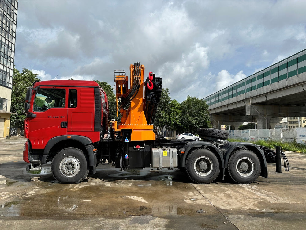 HOWO 6X4 25-ton folding boom tractor truck